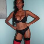 Sahne auf schwarzer Haut Bild Sahne auf schwarzer Haut Bild